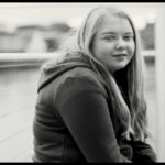 Girl looking over shoulder - Black and white photo