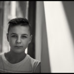 Boy looking into the camera - Black and white photo
