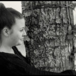 Woman hugging a tree - Black and white photo
