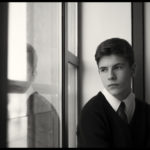 Student looking out the window - Black and white photo